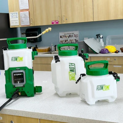 Storm sprayer with swap tanks
