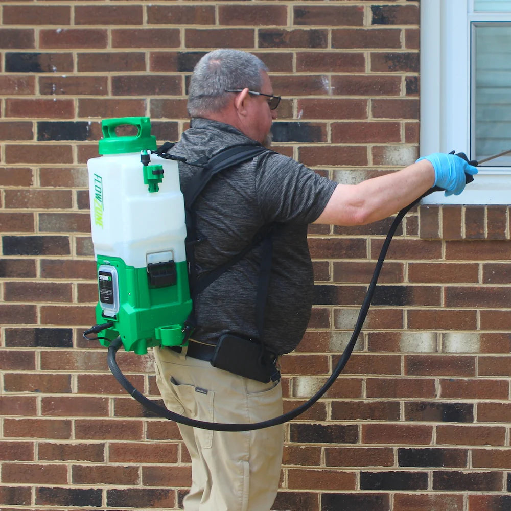 man spraying with storm 2g